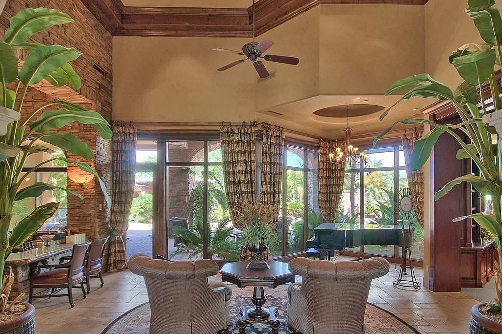 This $9,500,000 Home in Arizona offers a magnificent mixture of grass and desert landscaping