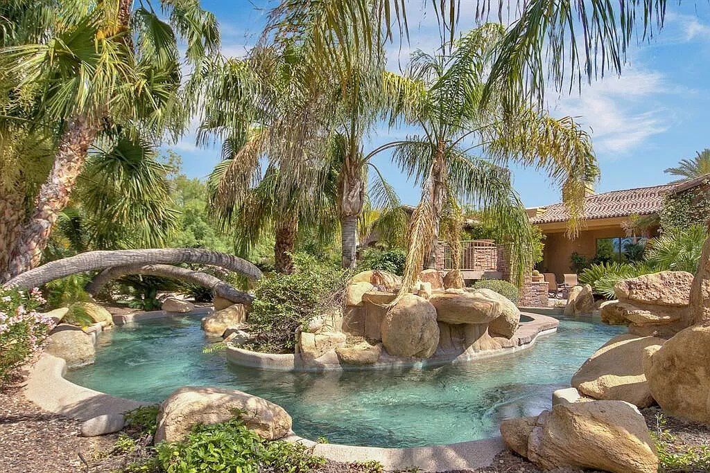 This $9,500,000 Home in Arizona offers a magnificent mixture of grass and desert landscaping
