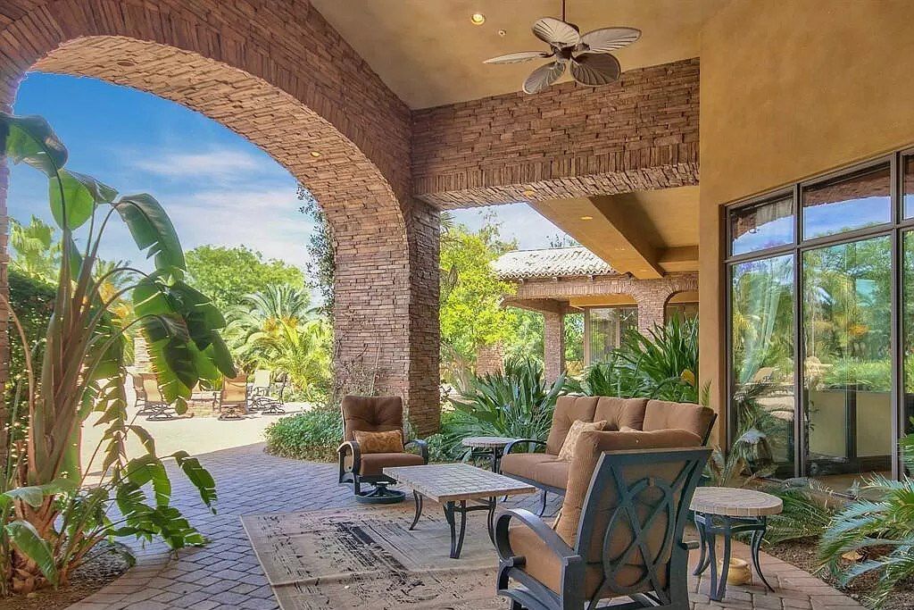 This $9,500,000 Home in Arizona offers a magnificent mixture of grass and desert landscaping