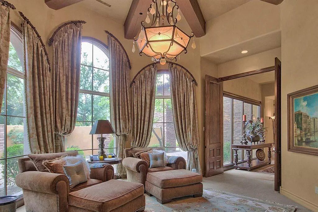 This $9,500,000 Home in Arizona offers a magnificent mixture of grass and desert landscaping