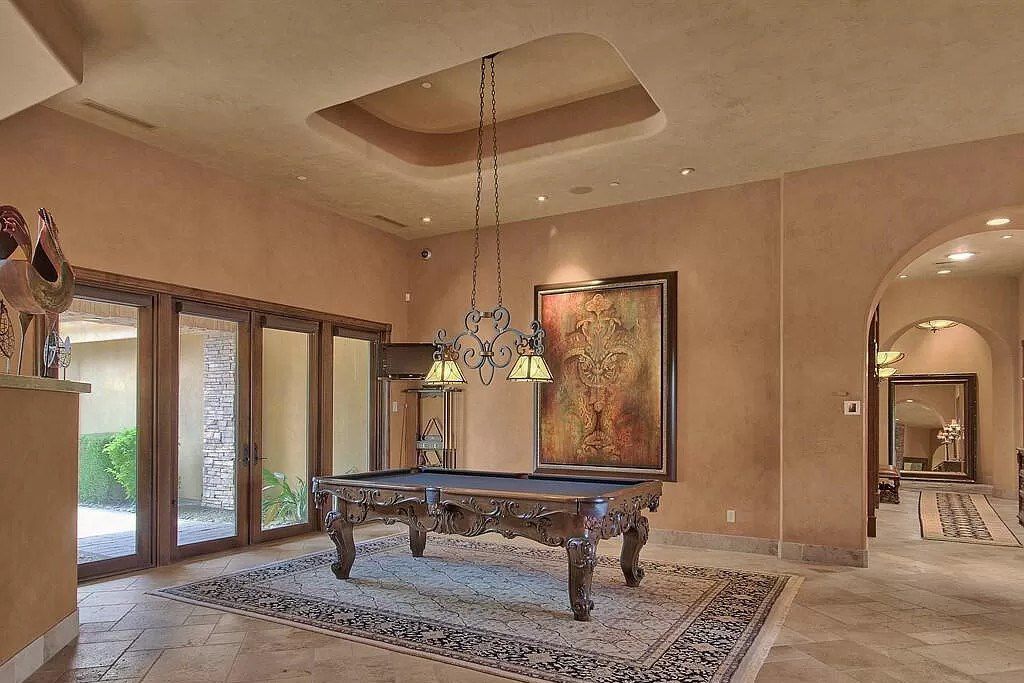 This $9,500,000 Home in Arizona offers a magnificent mixture of grass and desert landscaping