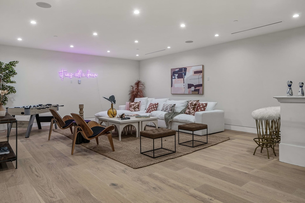 The Home in Beverly Grove is a modern new construction estate offers a sweeping open floor plan commencing from the colossal entry through the grand main level now available for sale. This home located at 731 N Curson Ave, Los Angeles, California