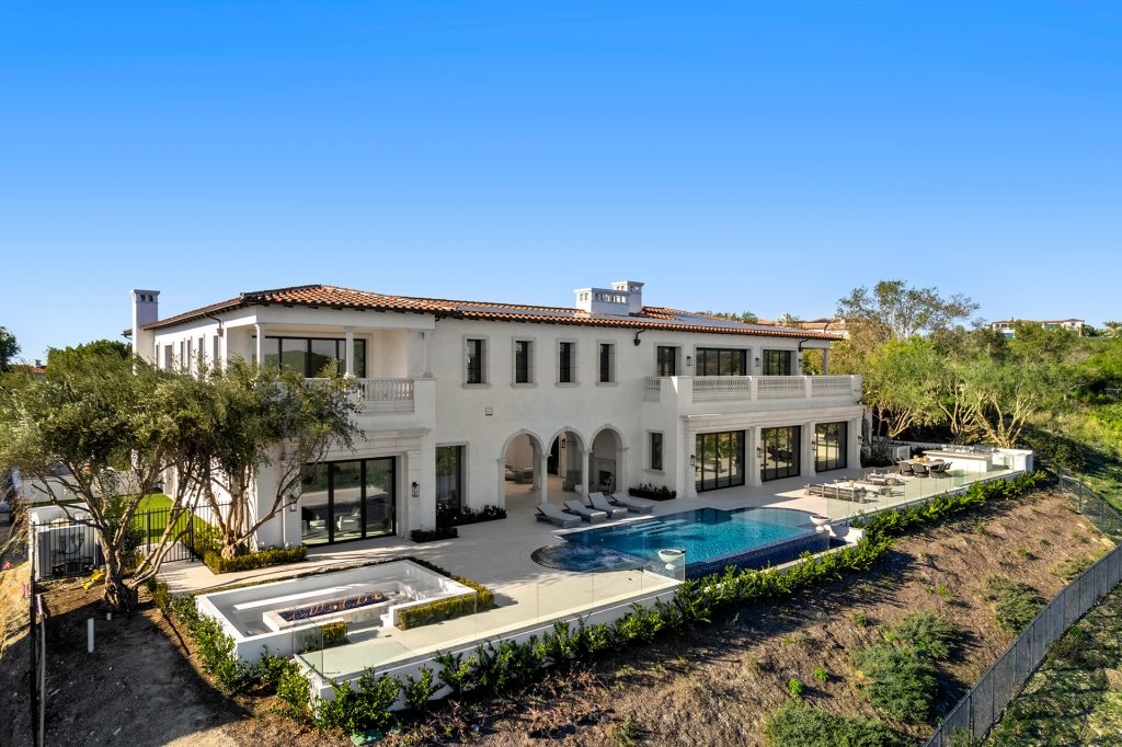 The Villa in Newport Coast is a Crystal Cove's newest custom estate prominently positioned on a private front row lot now available for sale. This home located at 2 Waves End, Newport Coast, California