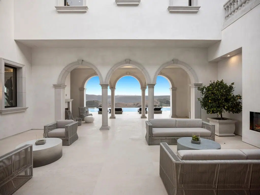 The Villa in Newport Coast is a Crystal Cove's newest custom estate prominently positioned on a private front row lot now available for sale. This home located at 2 Waves End, Newport Coast, California