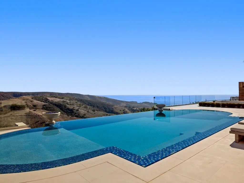 The Villa in Newport Coast is a Crystal Cove's newest custom estate prominently positioned on a private front row lot now available for sale. This home located at 2 Waves End, Newport Coast, California