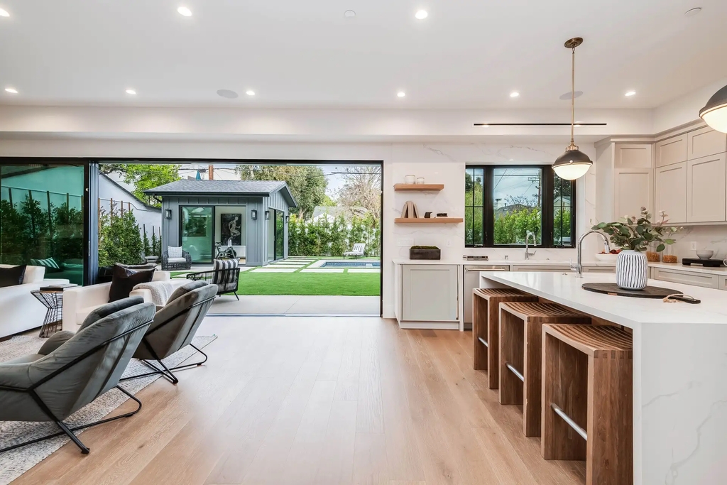 The Home in Studio City is a gorgeous new construction in prestigious Colfax Meadows perfect for indoor outdoor entertaining now available for sale. This home located at 4210 Kraft Ave, Studio City, California