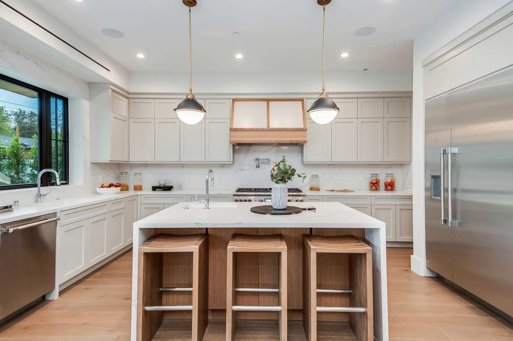 The Home in Studio City is a gorgeous new construction in prestigious Colfax Meadows perfect for indoor outdoor entertaining now available for sale. This home located at 4210 Kraft Ave, Studio City, California