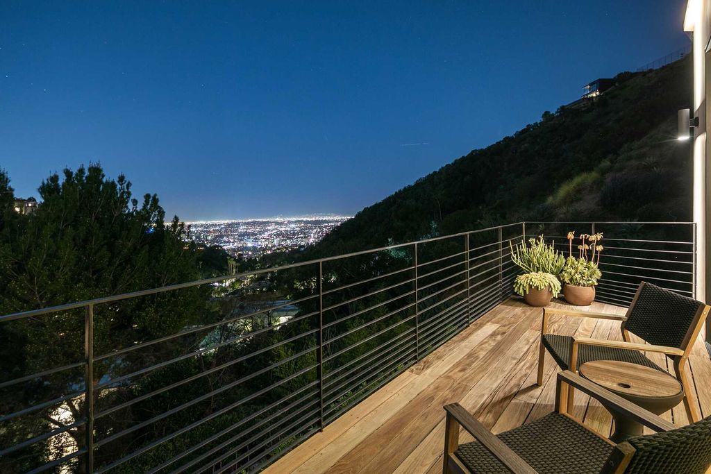 The West Hollywood Home is an exceptional compound includes an array of modern luxuries for a truly elevated living experience now available for sale. This home located at 1877 Rising Glen Rd, West Hollywood, California