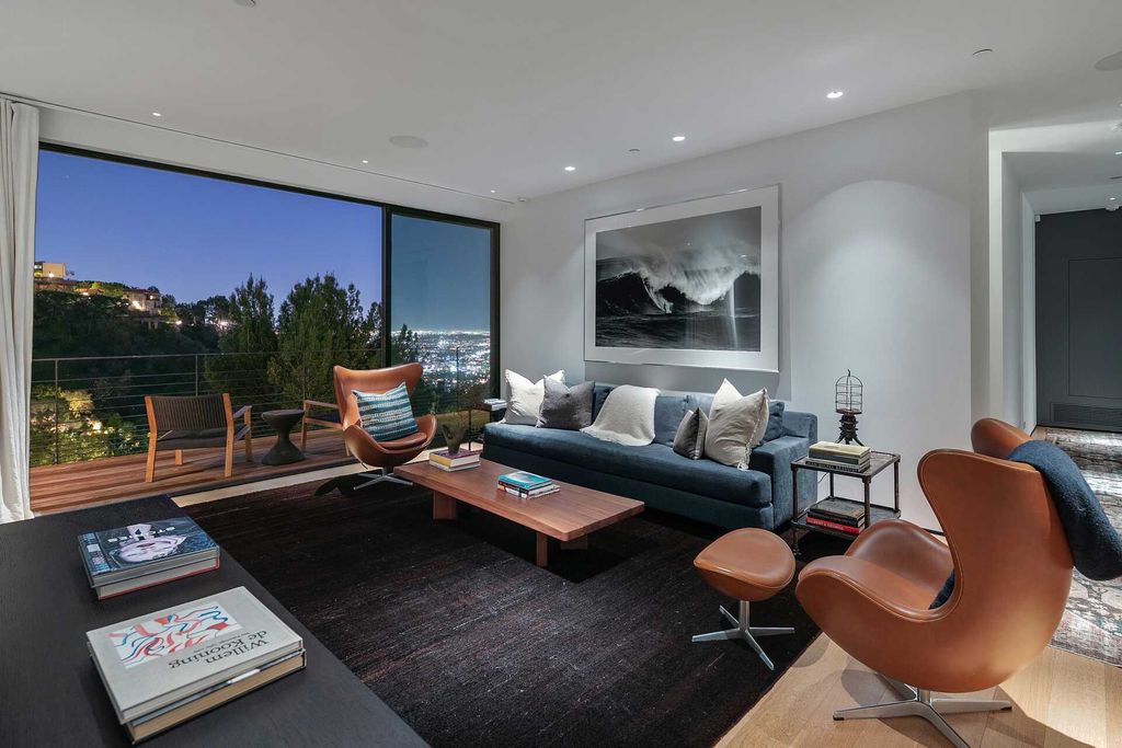 The West Hollywood Home is an exceptional compound includes an array of modern luxuries for a truly elevated living experience now available for sale. This home located at 1877 Rising Glen Rd, West Hollywood, California