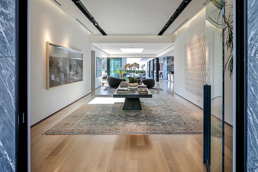 The West Hollywood Home is an exceptional compound includes an array of modern luxuries for a truly elevated living experience now available for sale. This home located at 1877 Rising Glen Rd, West Hollywood, California