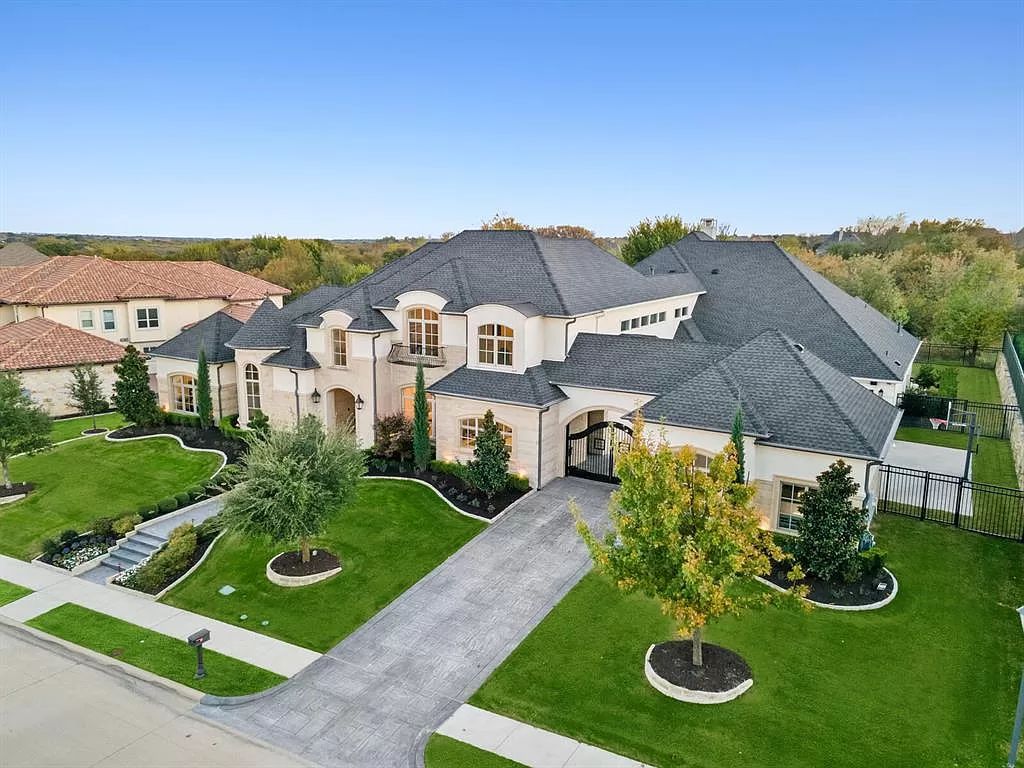 The Home in Allen set on the Twin Creeks Golf Course on a gated community boasts luxurious finishes with exceptional detail now available for sale. This home located at 413 Woodlake Dr, Allen, Texas