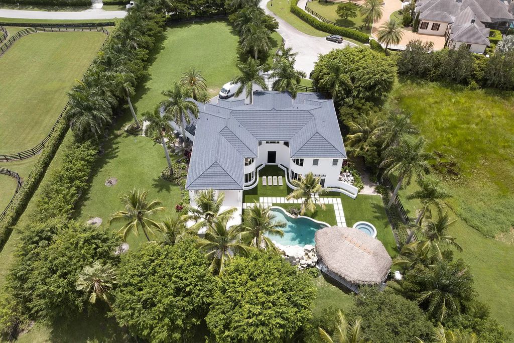 The Home in Wellington is an incredible contemporary estate in the prestigious community of Southfields now available for sale. This home located at 3580 Aiken Ct, Wellington, Florida