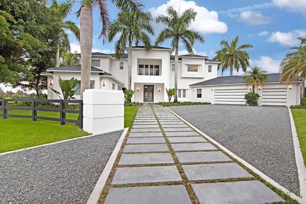 The Home in Wellington is an incredible contemporary estate in the prestigious community of Southfields now available for sale. This home located at 3580 Aiken Ct, Wellington, Florida