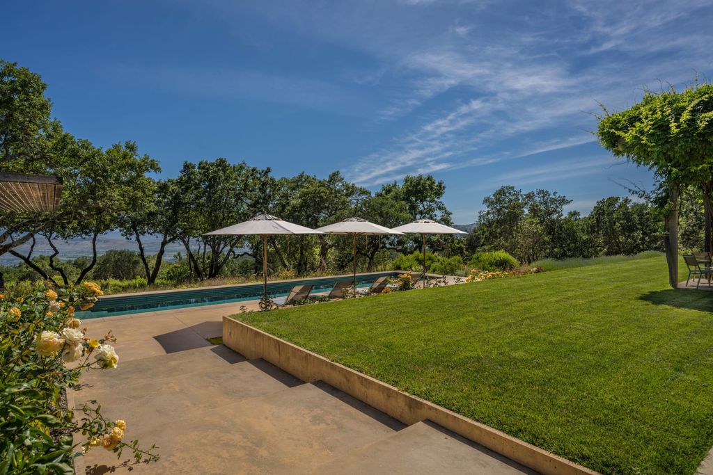 The Home in Sonoma is an architecturally significant estate with vineyard creates a harmonious convergence of nature now available for sale. This house located at 1861 Hale Rd, Sonoma, California
