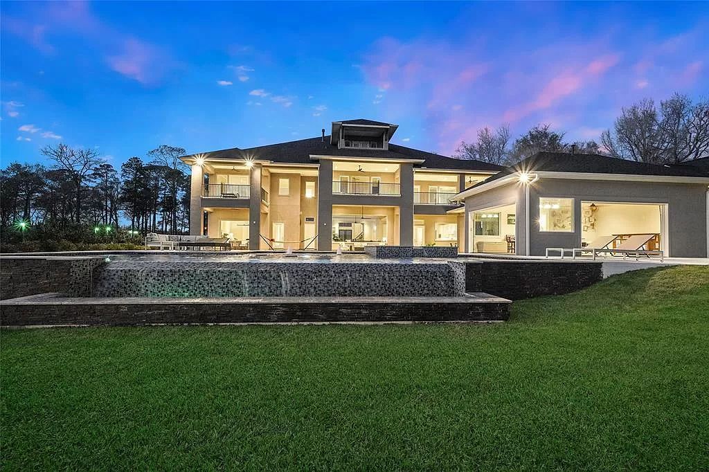 The Home in Montgomery is one of the newest luxury estates on Lake Conroe with expansive views of open water now available for sale. This home located at 16047 Walden Rd, Montgomery, Texas