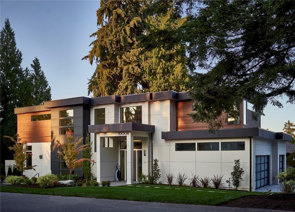 The House in Bellevue has great room living with a show stopping kitchen, dining room and a main-floor full-width deck, now available for sale. This home located at 10004 NE 28th Pl, Bellevue, Washington