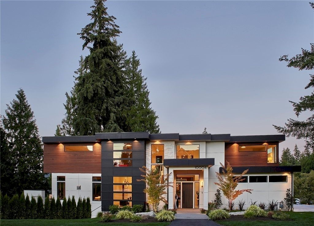 The House in Bellevue has great room living with a show stopping kitchen, dining room and a main-floor full-width deck, now available for sale. This home located at 10004 NE 28th Pl, Bellevue, Washington