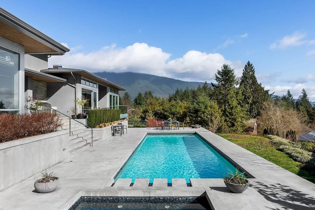 The Home in West Vancouver is a stunning custom-built home with panoramic views from forest to mountains & city, now available for sale. This home located at 545 Robin Hood Rd, West Vancouver, BC V7S 1T4, Canada