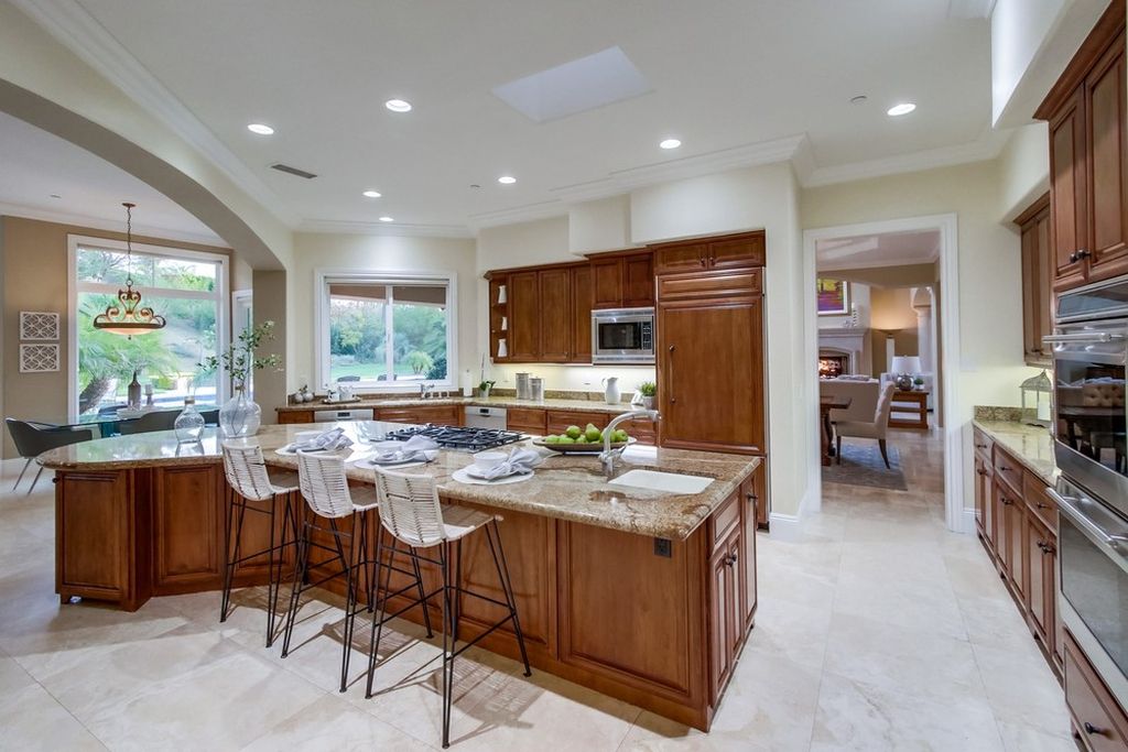 The Home in Poway is an exquisite custom residence in prestigious Old Winery Estates perfect for entertaining now available for sale. This home located at 17744 Old Winery Way, Poway, California