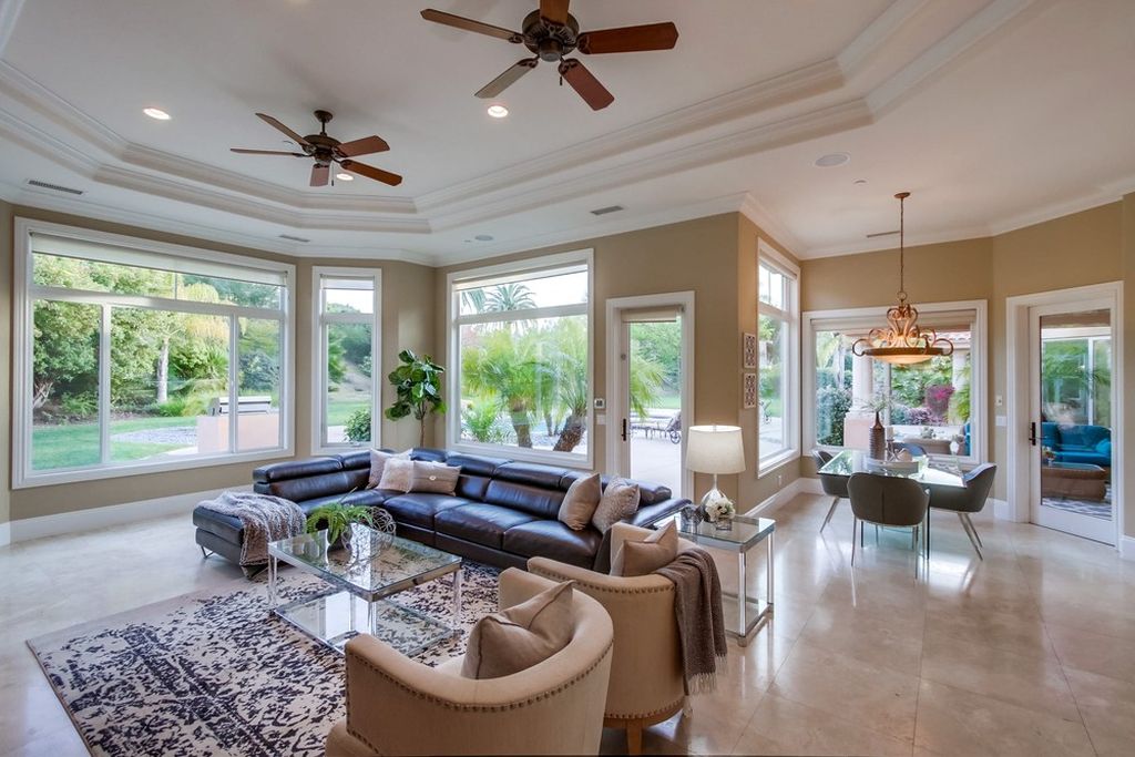 The Home in Poway is an exquisite custom residence in prestigious Old Winery Estates perfect for entertaining now available for sale. This home located at 17744 Old Winery Way, Poway, California