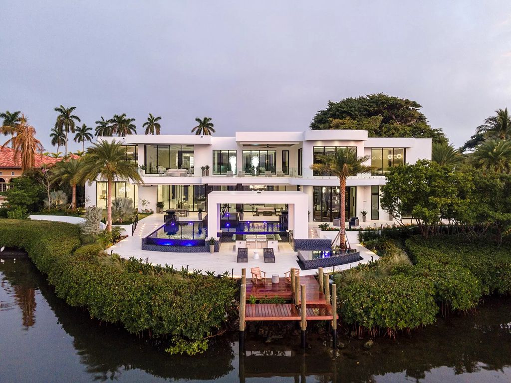 The Lake Worth Waterfront Mansion is a architectural marvel in the heart of Manalapan has an incredible infinity-edge pool now available for sale. This home located at 110 Churchill Way, Lake Worth, Florida