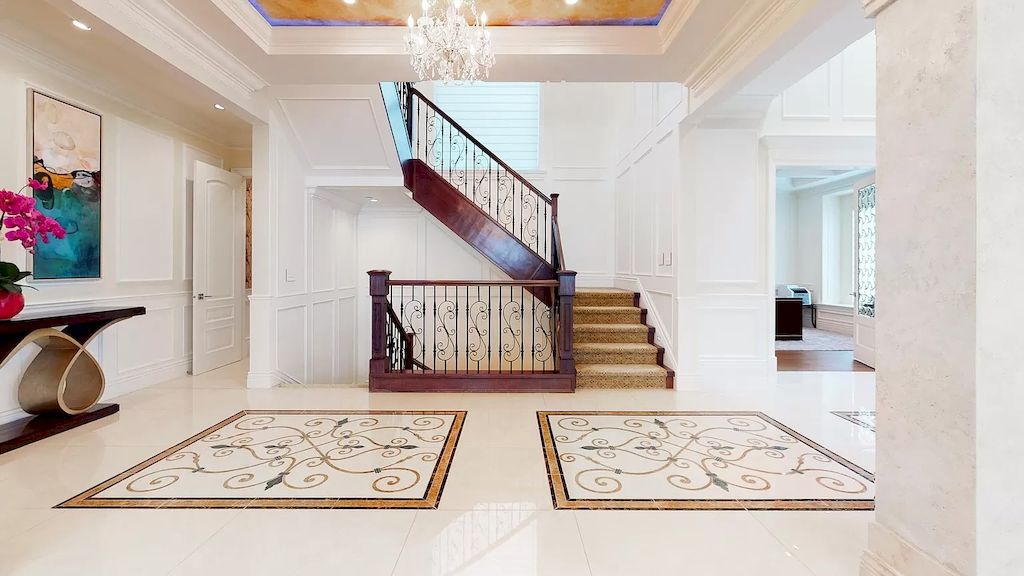 The Residence in Vancouver has double height 2 level ceiling height foyer with an elegant passage way, now available for sale. This home located at 8415 Wiltshire St, Vancouver, BC V6P 5H6, Canada