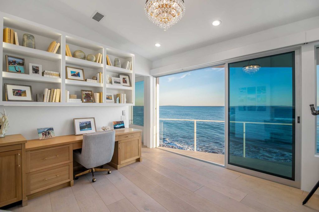 The Malibu Home is a turnkey home features impeccable high-quality details including dramatic, high ceilings, soffit lighting now available for sale. This home located at 27140 Malibu Cove Colony Dr, Malibu, California