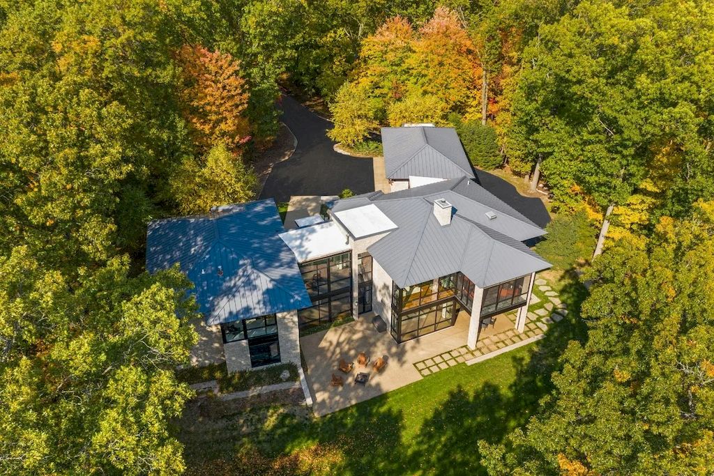 The Home in Michigan is a luxurious home having full stone exterior now available for sale. This home located at 6956 Cooley Lake Rd, White Lake, Michigan; offering 05 bedrooms and 05 bathrooms with 7,153 square feet of living spaces.
