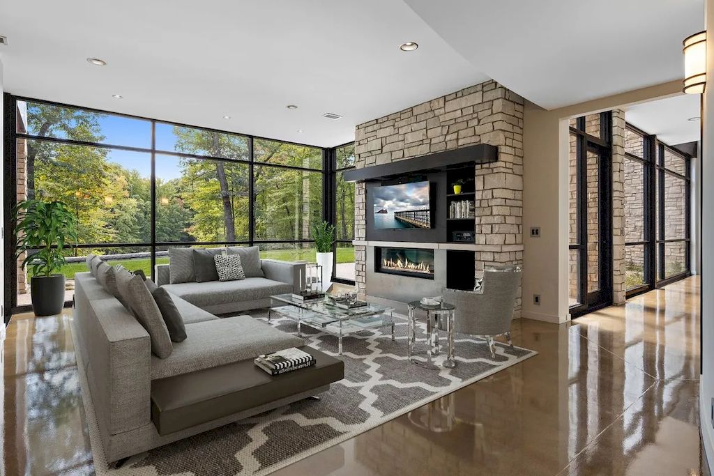 The Home in Michigan is a luxurious home having full stone exterior now available for sale. This home located at 6956 Cooley Lake Rd, White Lake, Michigan; offering 05 bedrooms and 05 bathrooms with 7,153 square feet of living spaces.