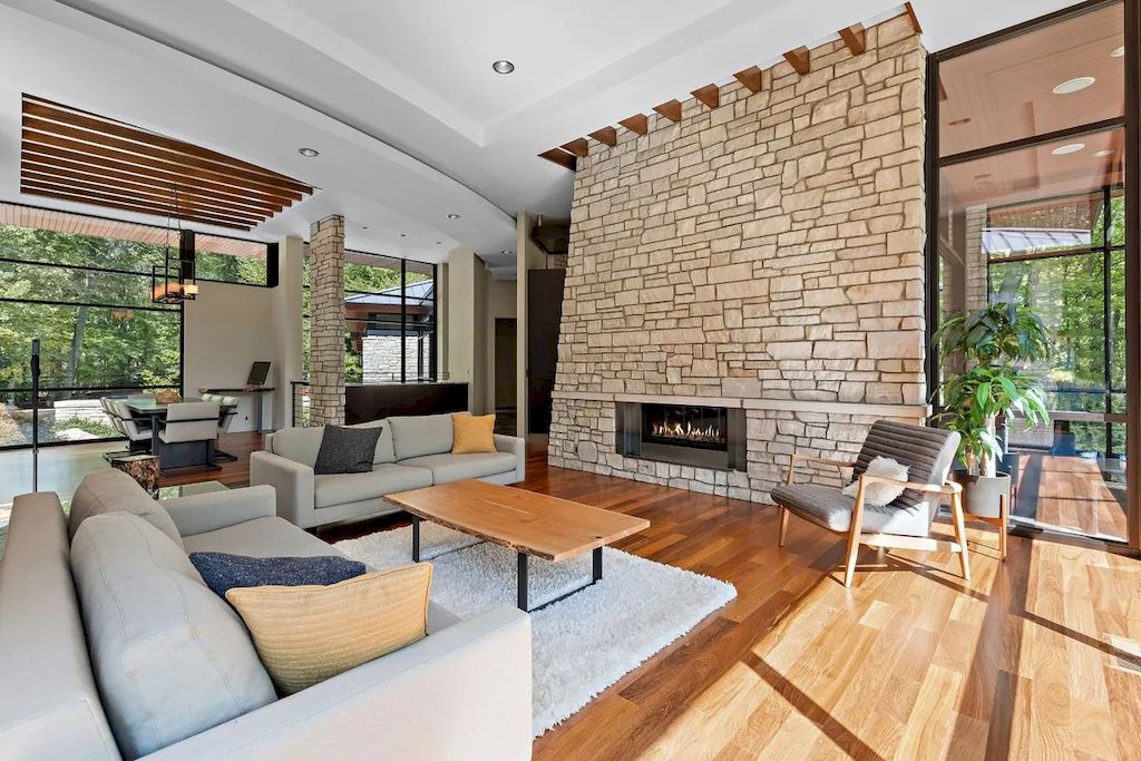 Nothing compares to a traditional brick fireplace, in all honesty. Farmhouse, industrial, and even futuristic designs may all incorporate a rustic vibe. The home's fireplace sticks out sharply and was specially built to accommodate the roof's inclination. As a consequence, a timeless and welcoming setting is created.