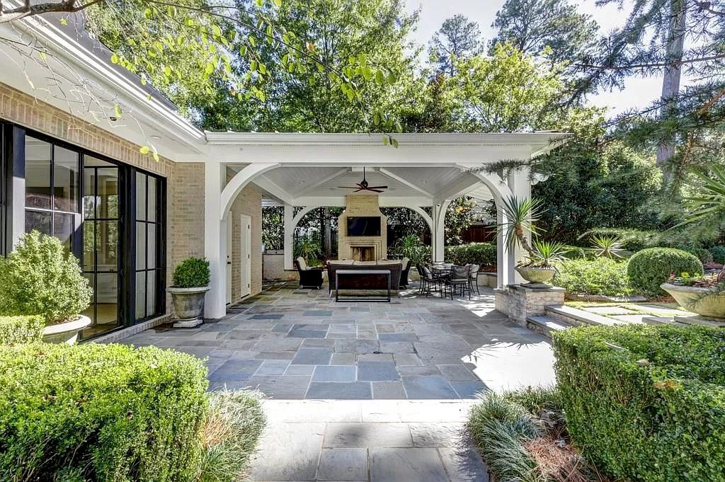 The Home in Georgia is a luxurious home of high quality, gorgeous design, and wonderful floor plan now available for sale. This home located at 1061 Stovall Blvd NE, Atlanta, Georgia; offering 04 bedrooms and 05 bathrooms with 5,920 square feet of living spaces. 