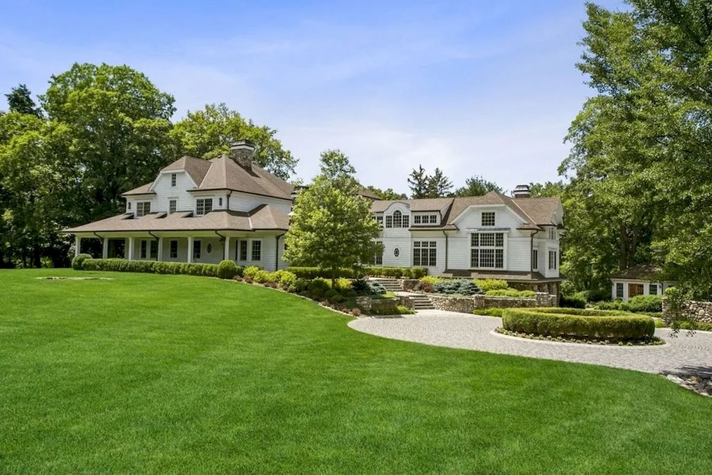 The Home in New Jersey is a luxurious farmhouse compounds featuring soaring ceilings, glass walls, a beautiful pool, a gallery and more now available for sale. This home located at 255 E Saddle River Rd, Saddle River, New Jersey; offering 06 bedrooms and 07 bathrooms with approximately 10 acres of land.