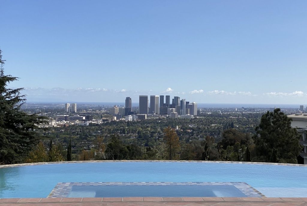 The Villa in Los Angeles is a newly built compound with separate guest house and pool bath perfect for for entertaining now available for sale. This home located at 9368 Flicker Way, Los Angeles, California