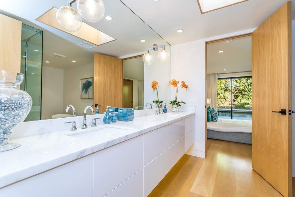 The Home in Beverly Hills is a stunning contemporary compound in a coveted lower Coldwater Canyon now available for sale. This home located at 9565 Cherokee Ln, Beverly Hills, California