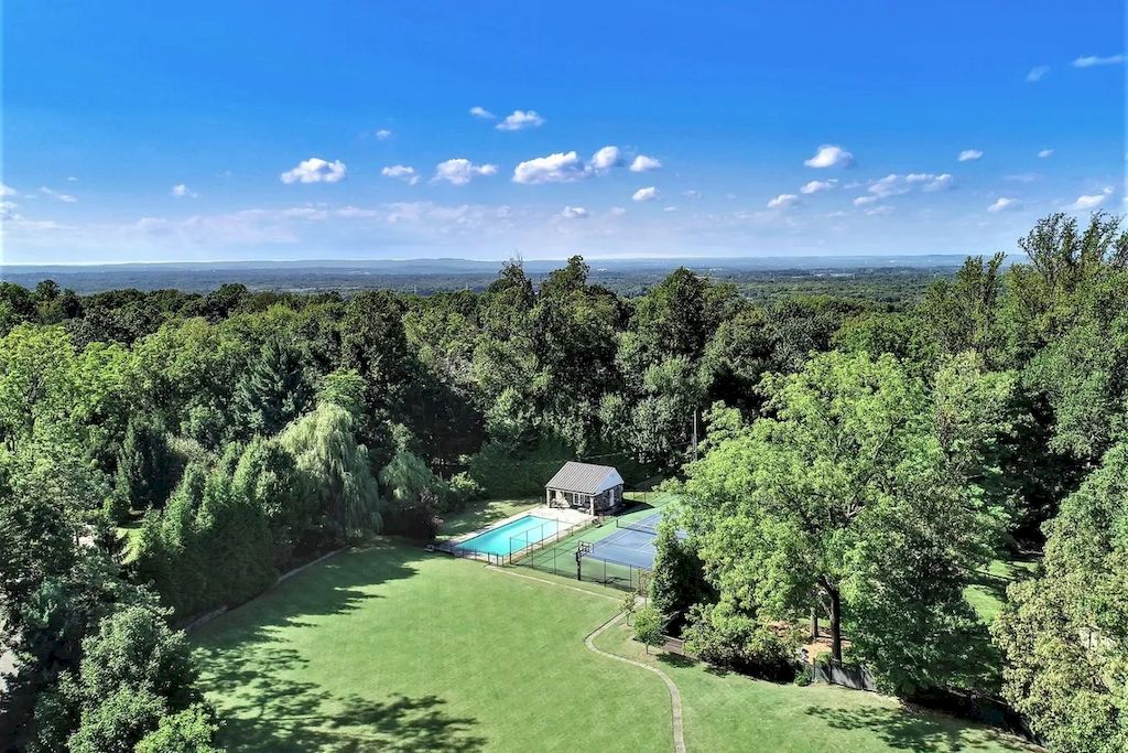 The Home in New Jersey is a luxurious home being undergone a major expansion to offer it all now available for sale. This home located at 85 Stewart Rd, Short Hills, New Jersey; offering 07 bedrooms and 09 bathrooms with 2.42 acres of land.