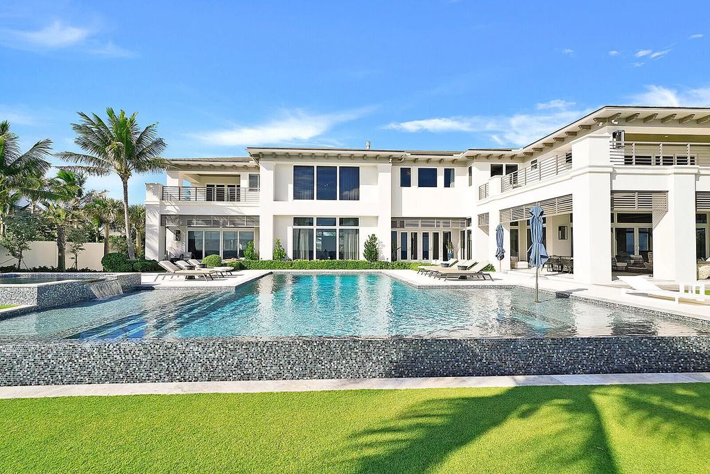 The Florida Mega Mansion is a beautiful newly built family retreat tastefully designed with spectacular finishes now available for sale. This home located at 1000 S Ocean Blvd, Lake Worth, Florida