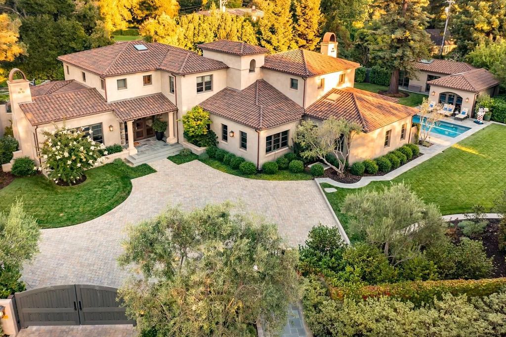 The Atherton Home is a spectacular estate set on an intimate setting built with high-end appointments and finishes now available for sale. This home located at 147 Patricia Dr, Atherton, California