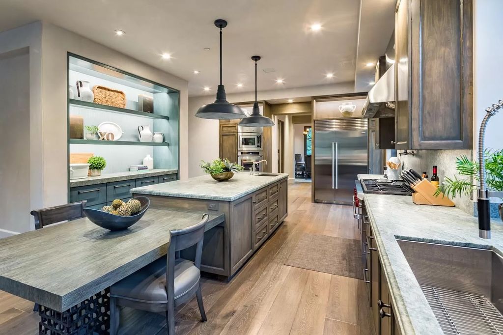 The Atherton Home is a spectacular estate set on an intimate setting built with high-end appointments and finishes now available for sale. This home located at 147 Patricia Dr, Atherton, California