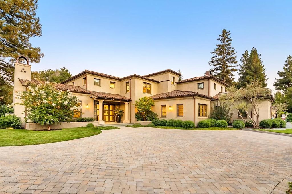 The Atherton Home is a spectacular estate set on an intimate setting built with high-end appointments and finishes now available for sale. This home located at 147 Patricia Dr, Atherton, California