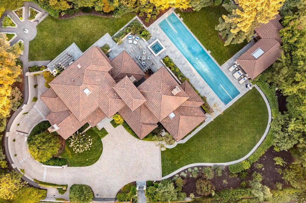 The Atherton Home is a spectacular estate set on an intimate setting built with high-end appointments and finishes now available for sale. This home located at 147 Patricia Dr, Atherton, California