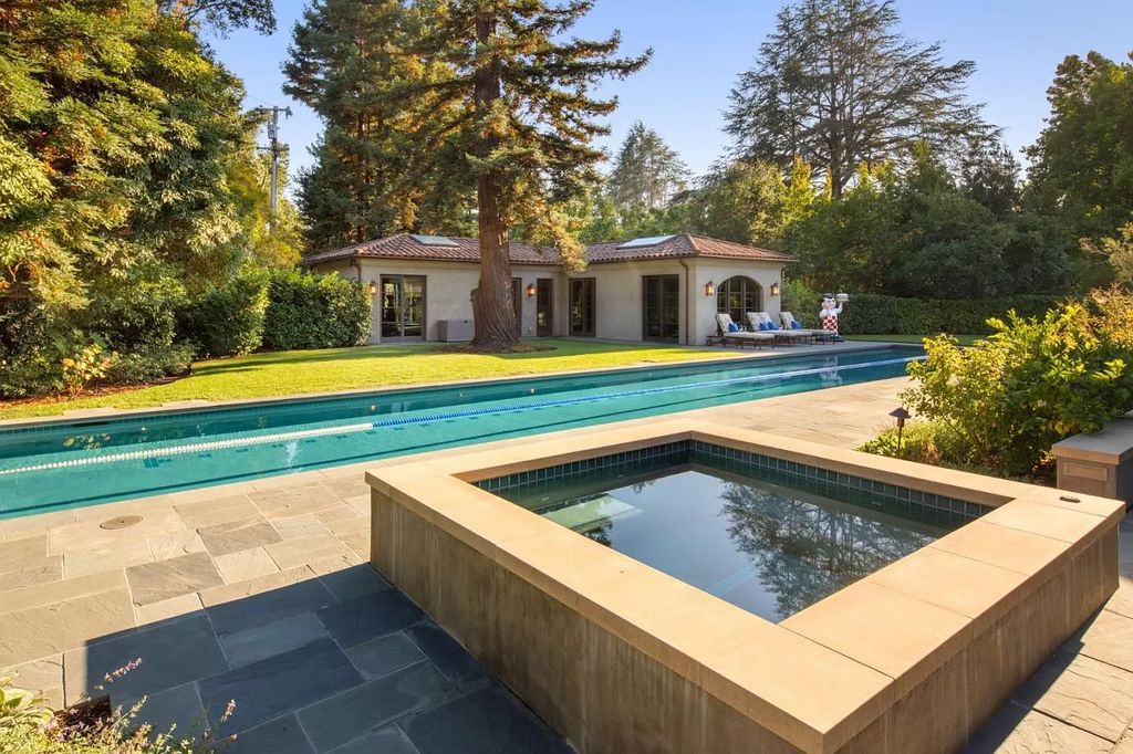 The Atherton Home is a spectacular estate set on an intimate setting built with high-end appointments and finishes now available for sale. This home located at 147 Patricia Dr, Atherton, California