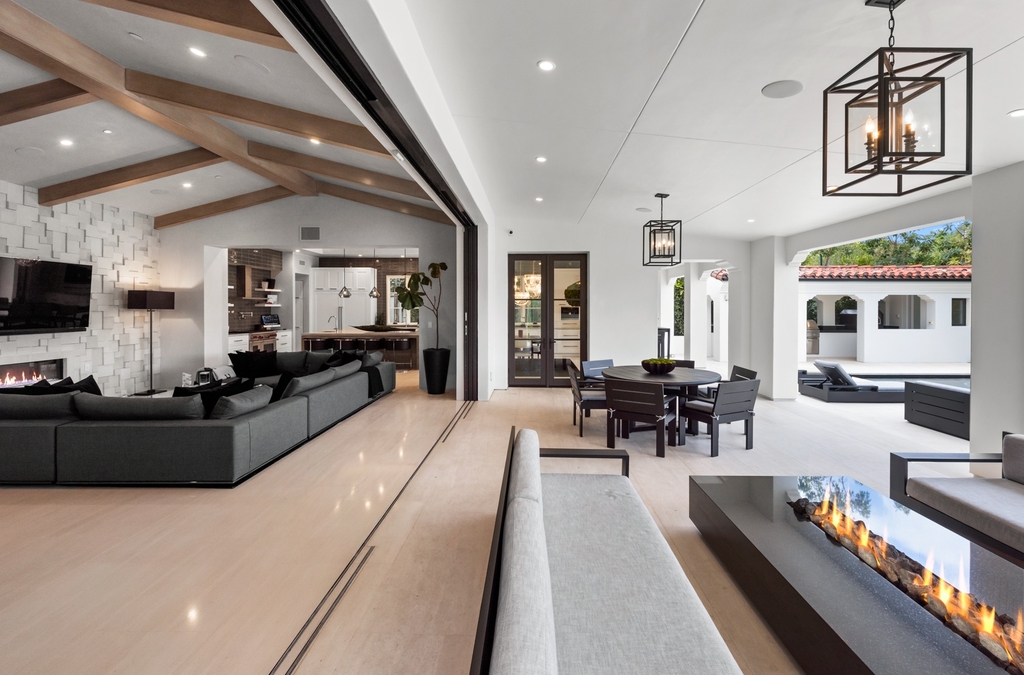 The Home in Newport Beach is a beautifully constructed estate showcases an open floor plan with stunning views of the rolling hills now available for sale. This home located at 42 Offshore, Newport Beach, California