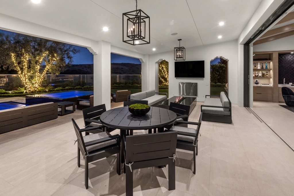 The Home in Newport Beach is a beautifully constructed estate showcases an open floor plan with stunning views of the rolling hills now available for sale. This home located at 42 Offshore, Newport Beach, California