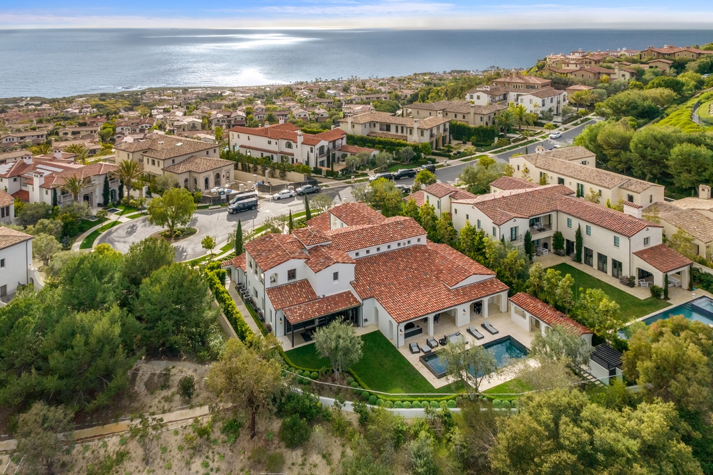 The Home in Newport Beach is a beautifully constructed estate showcases an open floor plan with stunning views of the rolling hills now available for sale. This home located at 42 Offshore, Newport Beach, California