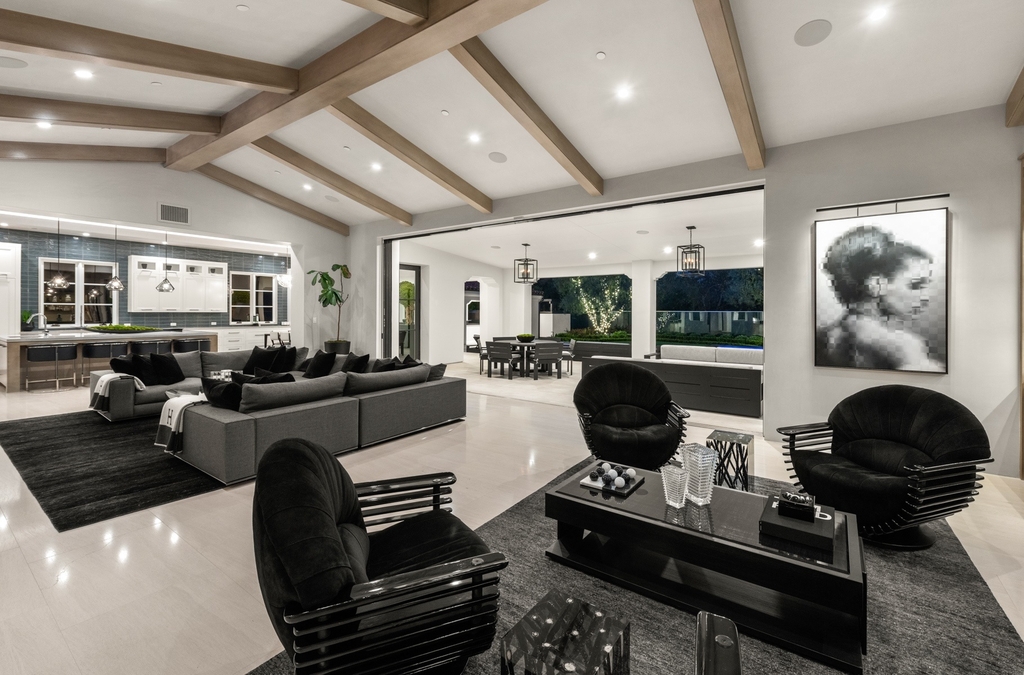 The Home in Newport Beach is a beautifully constructed estate showcases an open floor plan with stunning views of the rolling hills now available for sale. This home located at 42 Offshore, Newport Beach, California