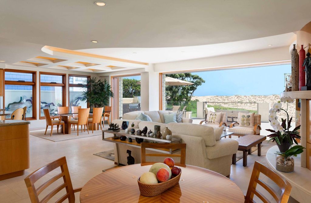 The Home in Newport Beach is a contemporary oceanfront compound rests on a double lot and includes a detached guest house and swimming pool now available for sale. This home located at 1510 E Oceanfront, Newport Beach, California
