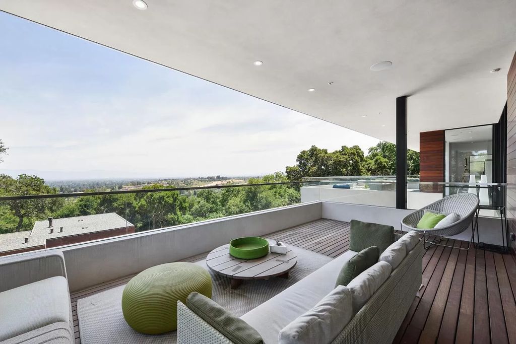The Home in Los Altos is an architectural masterpiece offers abundant amenities and magnificent panoramic Bay Area views now available for sale. This house located at 10718 Mora Dr, Los Altos, California