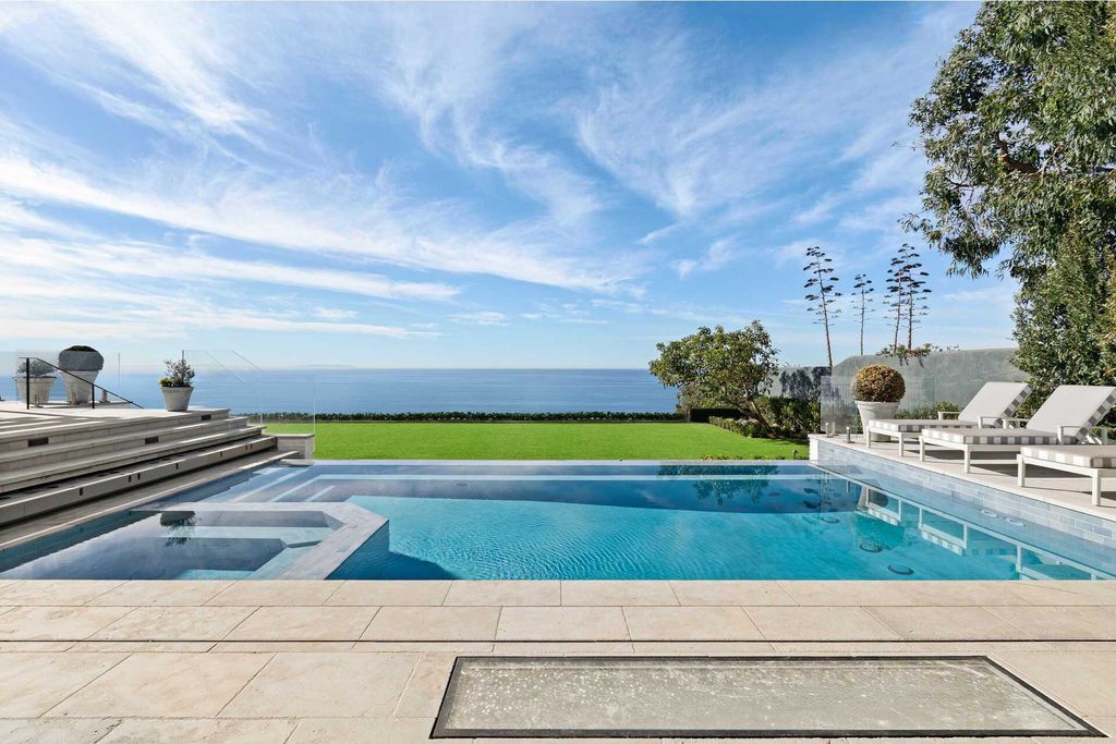 The Home in Pacific Palisades is a traditional home boasting unobstructed views that stretch from Palos Verdes to Malibu now available for sale. This home located at 15000 Corona Del Mar, Pacific Palisades, California