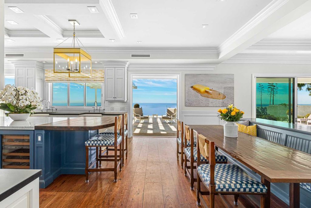 The Home in Pacific Palisades is a traditional home boasting unobstructed views that stretch from Palos Verdes to Malibu now available for sale. This home located at 15000 Corona Del Mar, Pacific Palisades, California