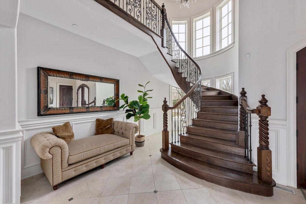 The Home in Illinois is a luxurious gated home with great attention to detail throughout now available for sale. This home located at 403 Fox Trail Ln, Oak Brook, Illinois; offering 06 bedrooms and 08 bathrooms with 11,161 square feet of living spaces.